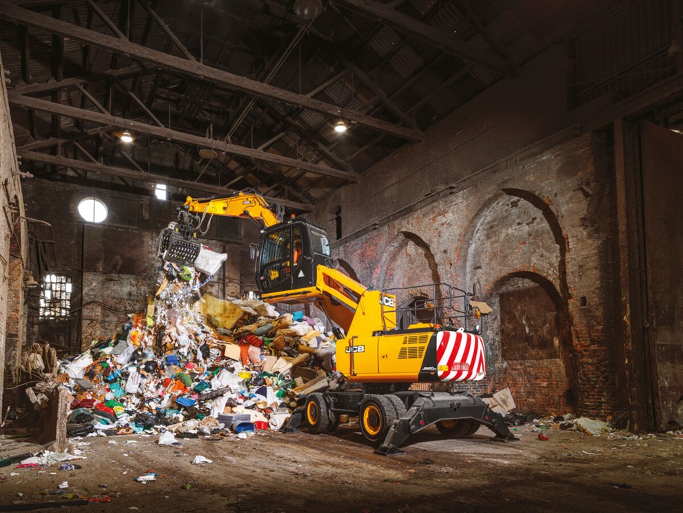 Wheeled Excavator in recycling centre 