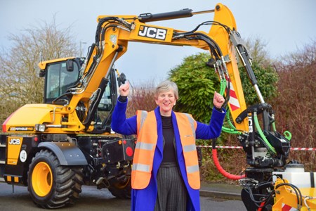 Roads Minister Lilian Greenwood with the JCB Pothole Pro-Press Release